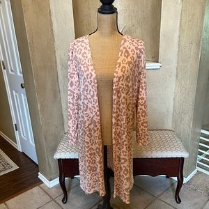 Pink animal print cardigan in plus size 3X